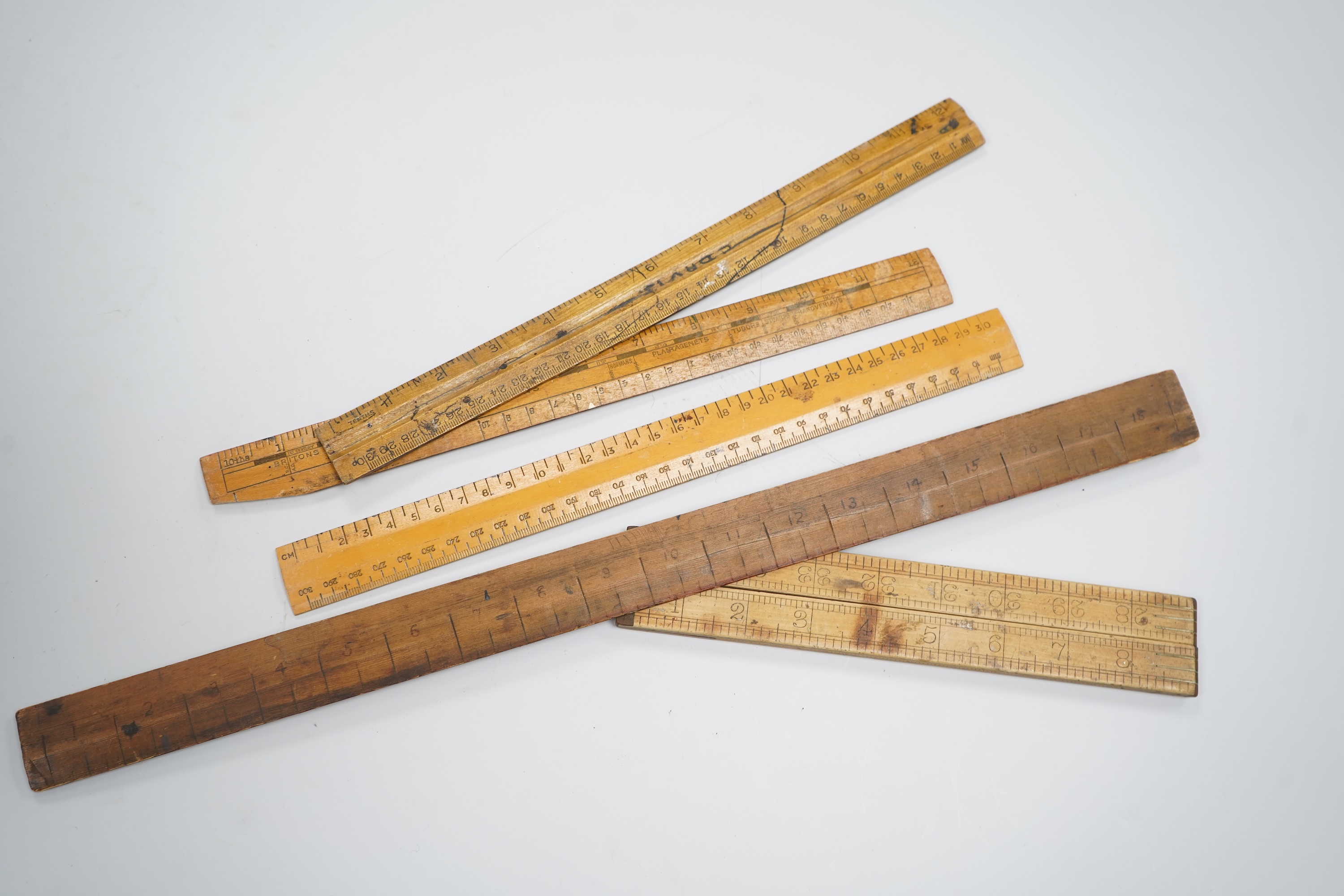 A large collection of thirty Antique and Vintage boxwood rules including the Jacob's Biscuits metal ruler. c.1900